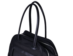 Large capacity black nylon tote bag interior with multiple storage pockets for everyday use