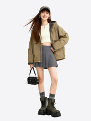 Black nylon crossbody bag worn on shoulder by model, showing casual daily commuter style